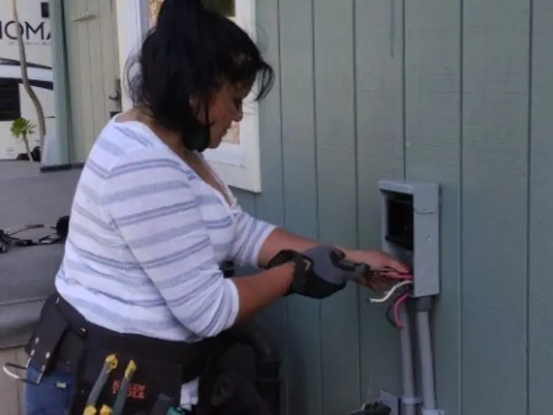 Licensed electrician wiring an exterior subpanel in Prescott Valley