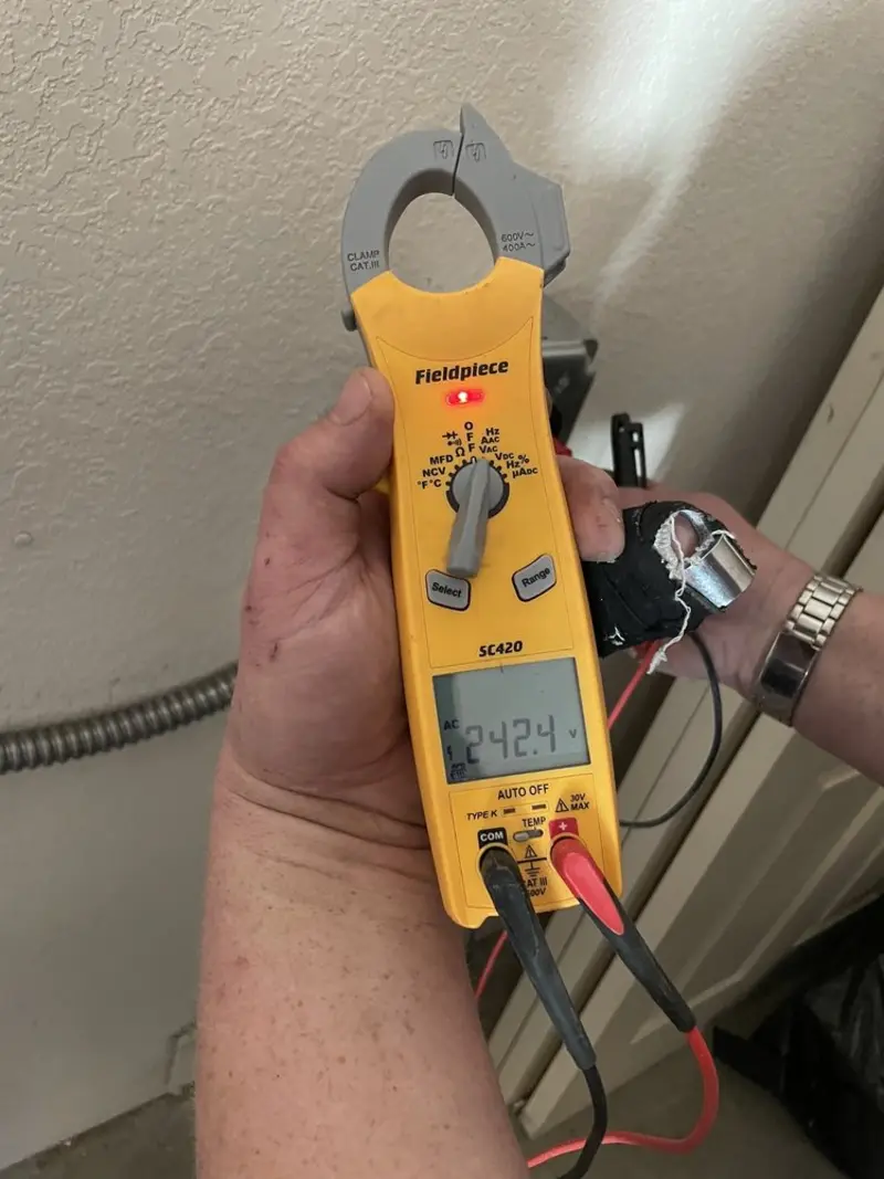 Voltage testing with clamp meter during Ceiling Fan Installation in Prescott Valley